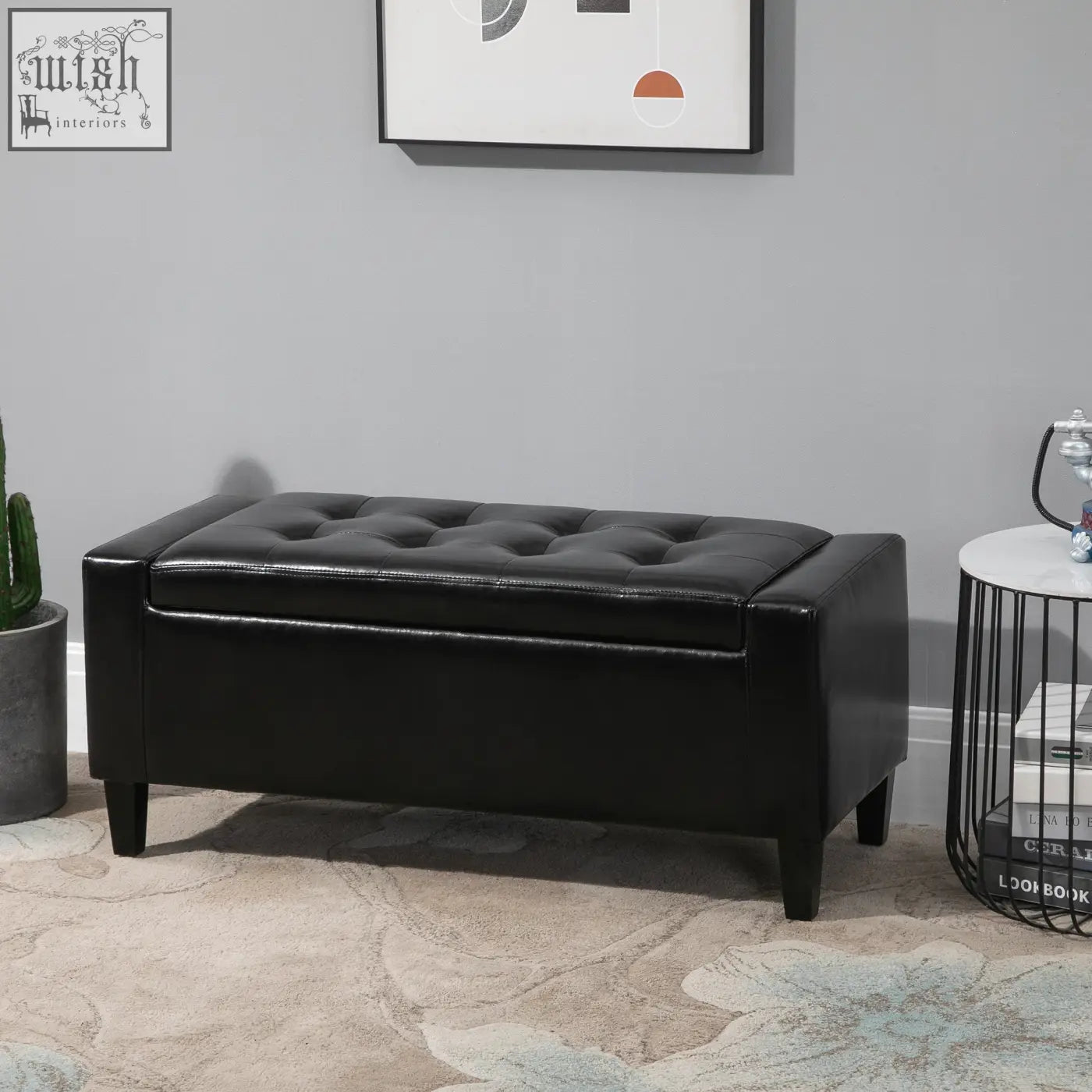 Black tufted storage ottoman bench with faux leather upholstery and sturdy legs for modern living spaces