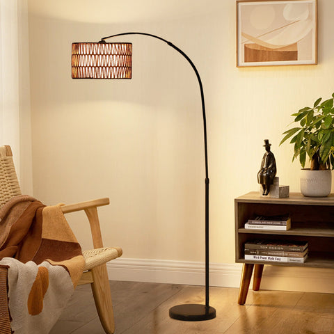 Black arched floor lamp with dual-layer woven wicker shade and hemp rope featuring foot switch for living room or office