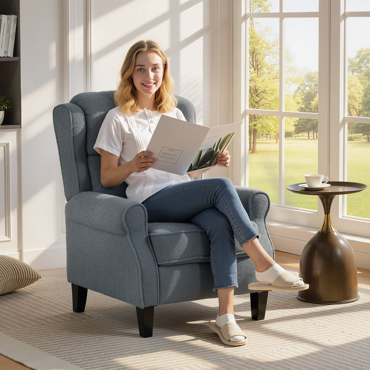 Blue upholstered homcom recliner armchair with rolled arms dark wooden legs and soft teddy fleece in grey color