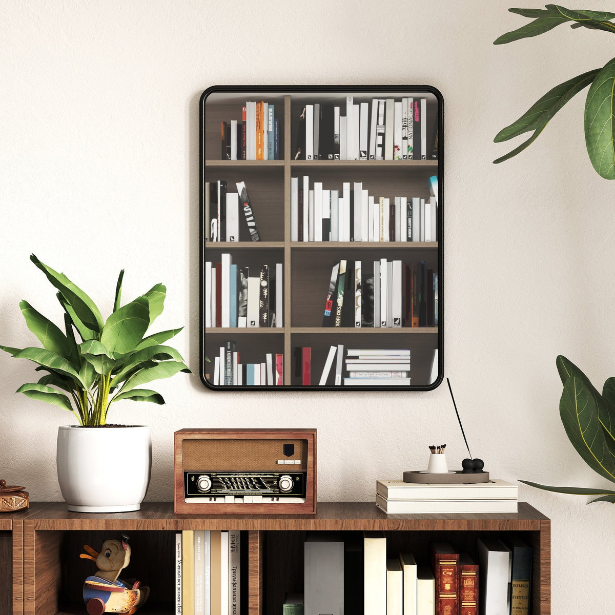 Black-framed metal wall mirror with hd glass and sturdy backboard perfectly complements a wall-mounted bookshelf setup