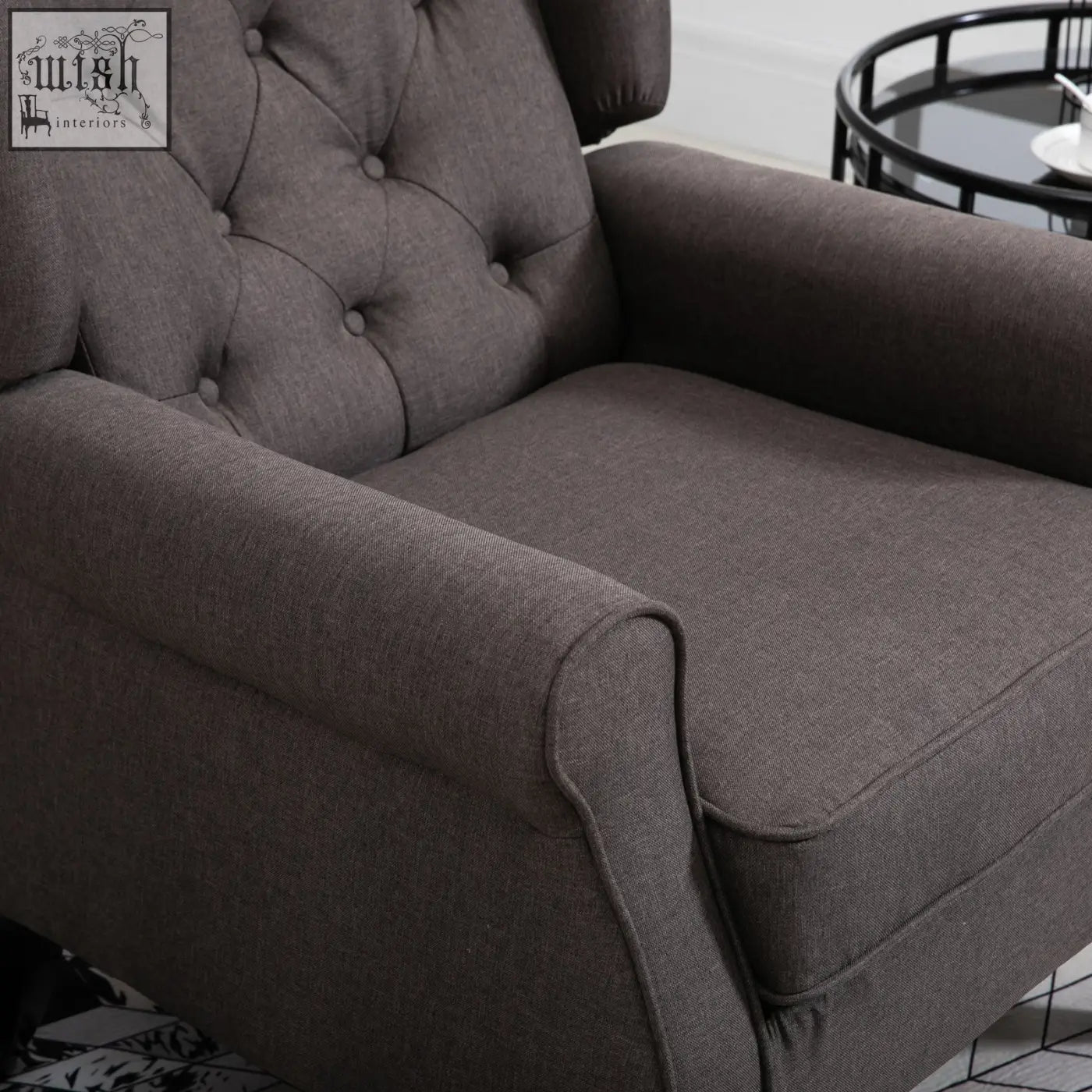 Plush dark gray retro accent chair with wood frame button tufted design and rolled arms for living room use
