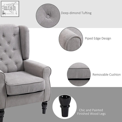 Gray velvet wingback accent chair with deep diamond button tufted design and piped edges on painted wood legs