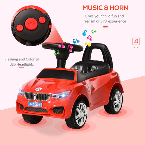 Red plastic homcom ride on car with black steering wheel high backrest and under-seat storage for toddlers