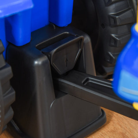 Black plastic toy truck pedal with blue cargo box component on the back of homcom ride on tractor walker with steering wheel