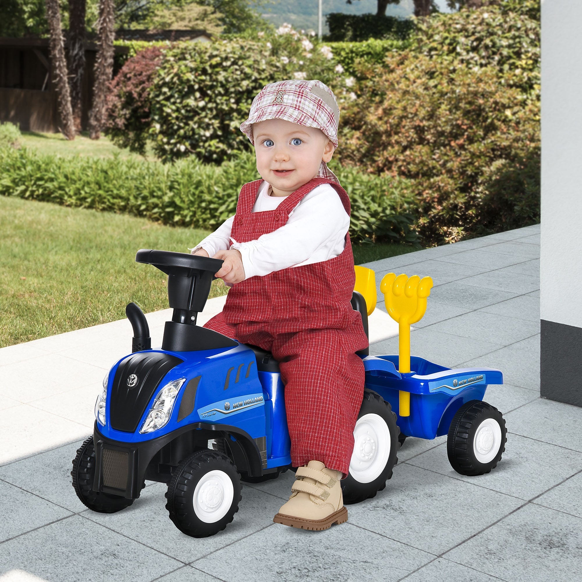 Blue homcom ride on tractor toddler walker with steering wheel and cargo box holding yellow pitchfork toy