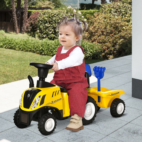 Yellow and black homcom ride on tractor with steering wheel and blue shovel attached to cargo box trailer for toddlers