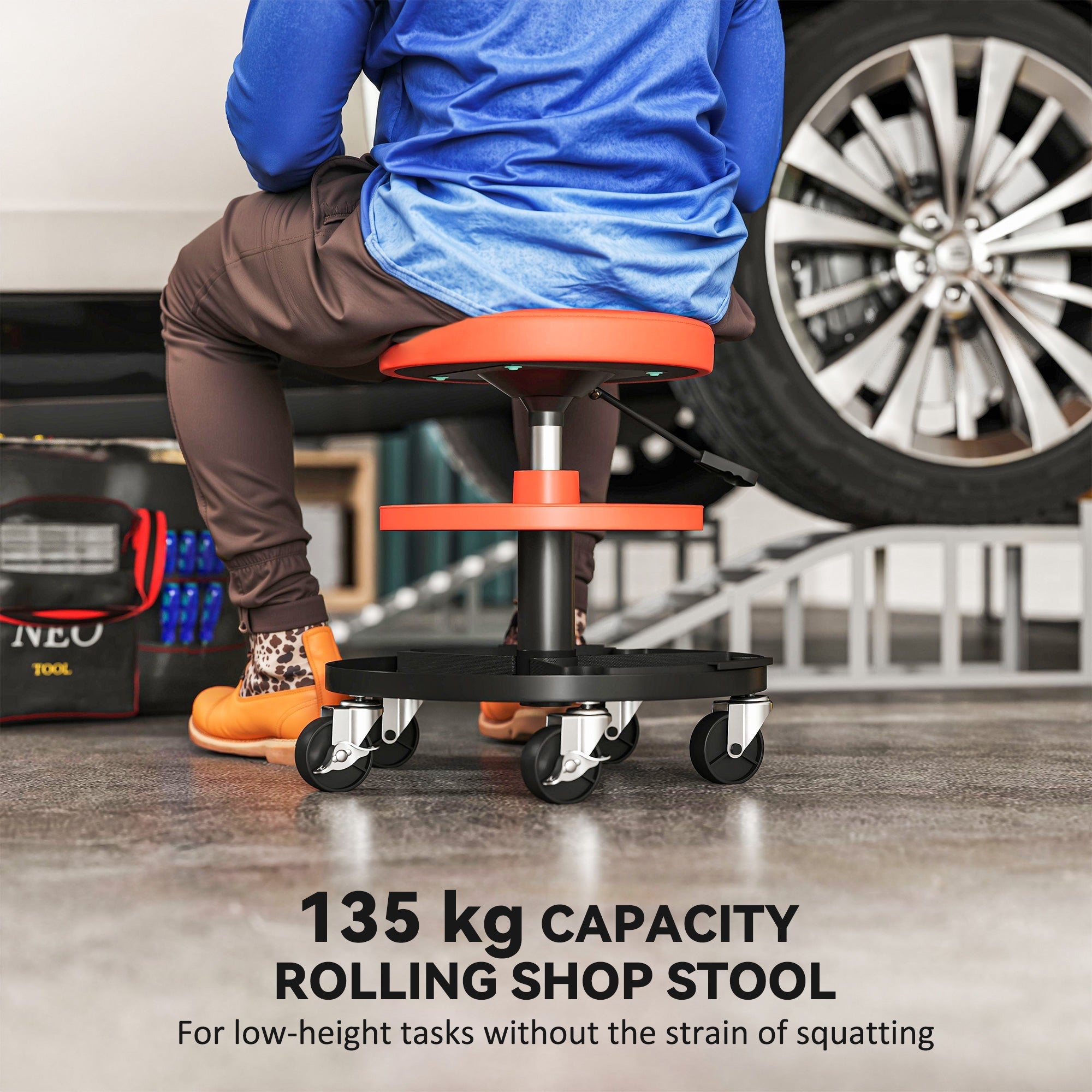 Homcom rolling mechanic stool in orange and black with pneumatic height adjustment and swivel casters for workshop use