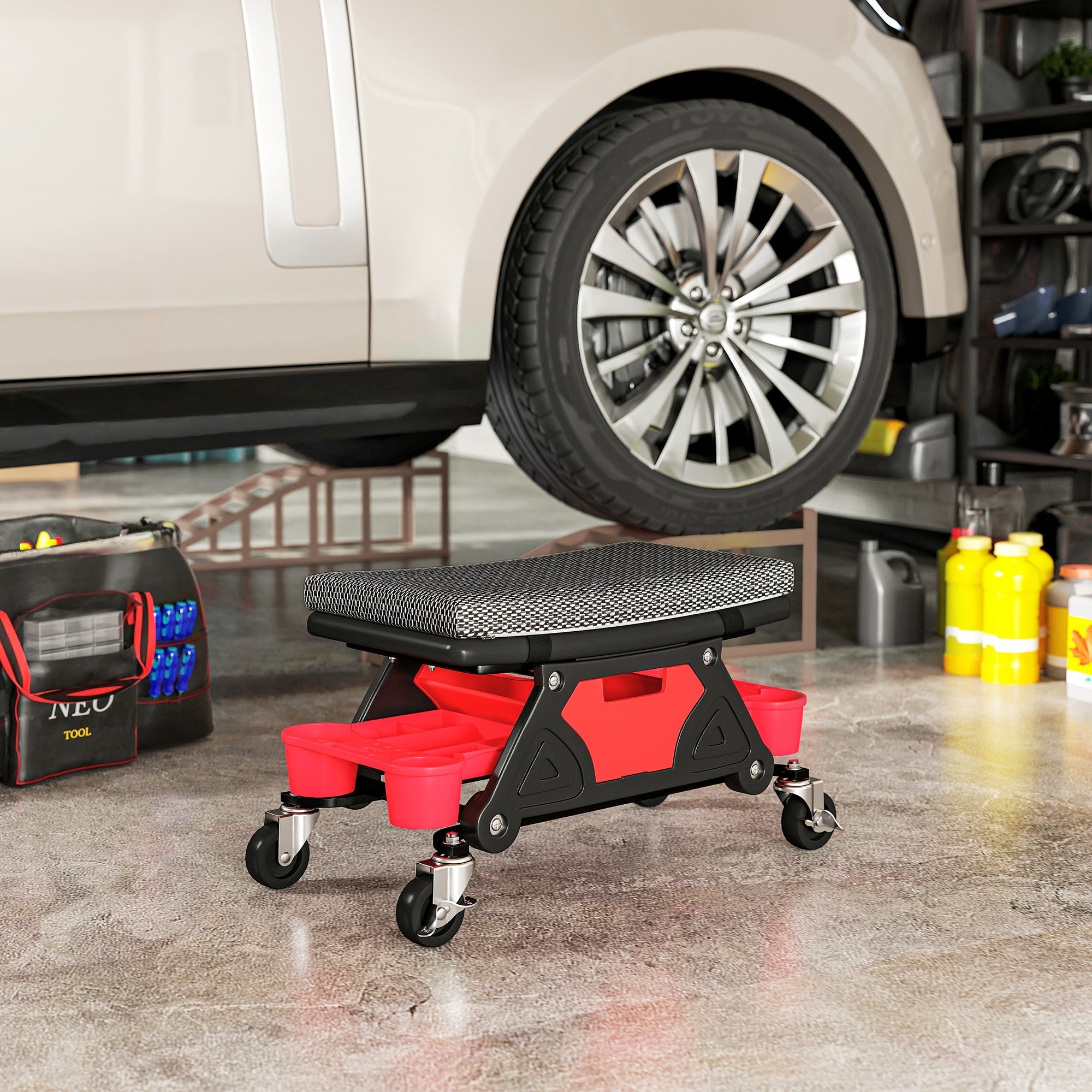 Homcom rolling mechanic stool with textured gray cushion black red frame two storage trays and rubber casters for garage use