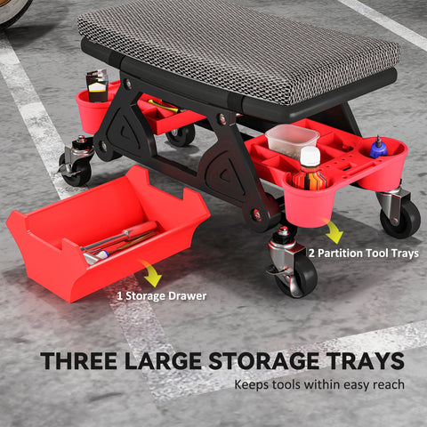 Red and black homcom rolling mechanic stool with textured gray seat, two storage trays, and rubber casters for mobility