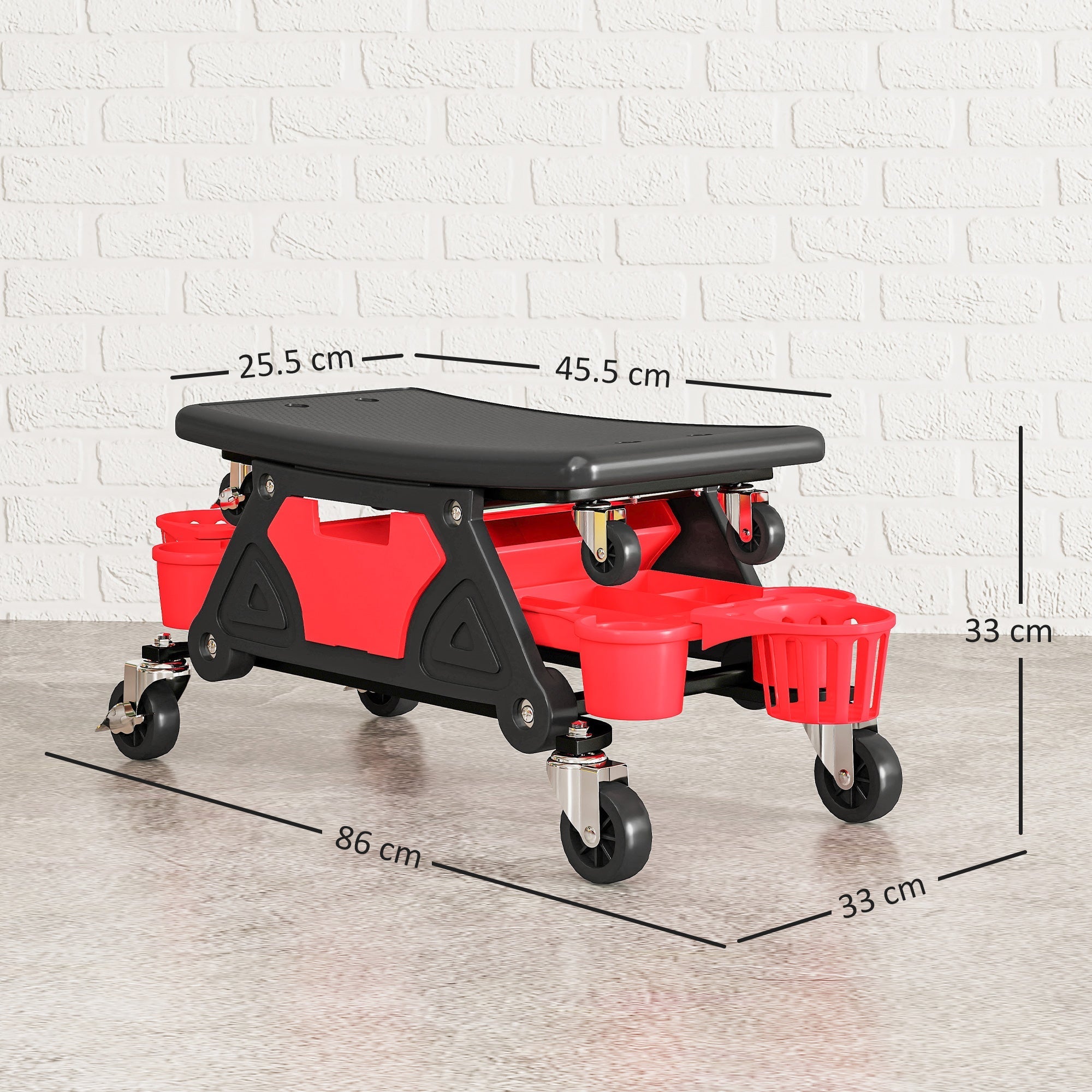 Red and black plastic mechanic stool with concave seat, storage trays, and 360 swivel wheels for workshop use