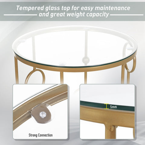 Gold-toned metal coffee table with clear tempered glass top featuring cool hoop and ball design for living room use