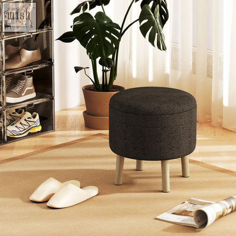 Dark gray linen fabric upholstered storage ottoman with padded seat and light beige wooden legs by homcom