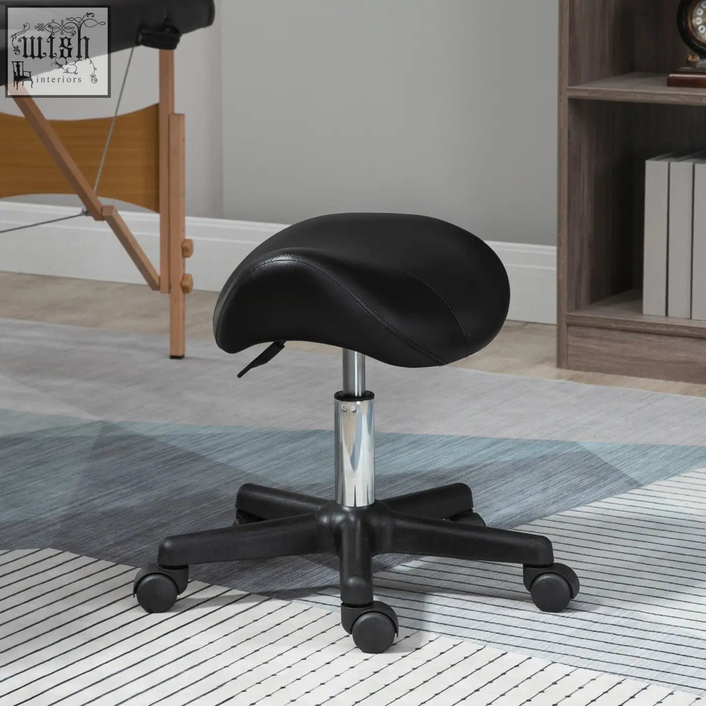 Black homcom saddle stool with padded pu leather seat and steel frame on rolling chrome base for salon use