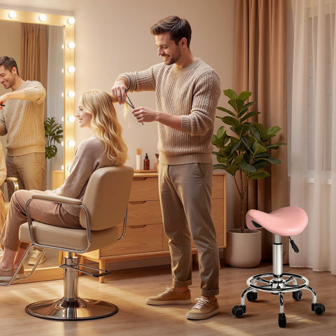 Pink padded HOMCOM salon saddle stool with chrome base and black caster wheels for spa massage and beauty use