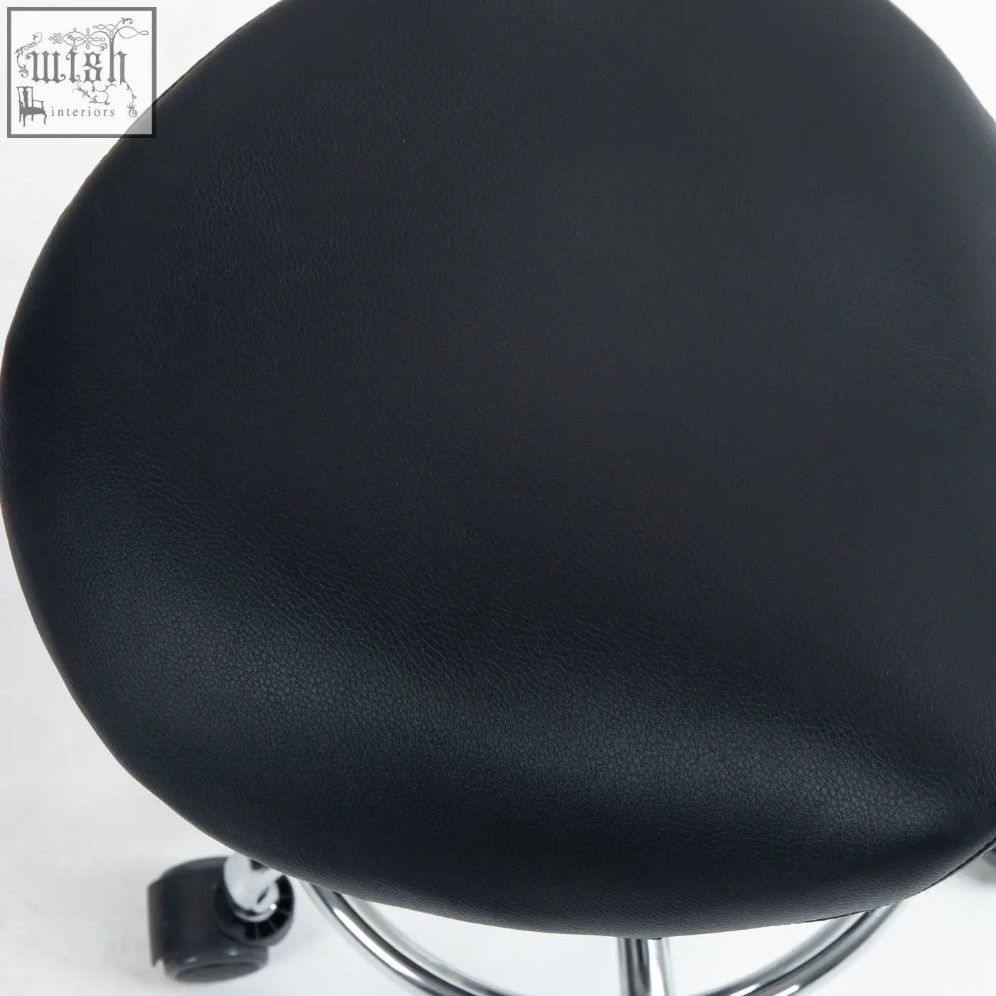Black homcom saddle stool with padded seat and chrome base ideal for tattoo studios spa and beauty use