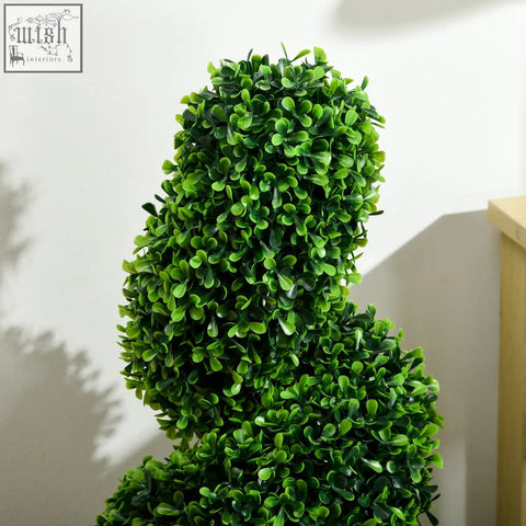 A set of 2 vibrant green artificial spiral boxwood trees with dense foliage in pots for indoor outdoor decor