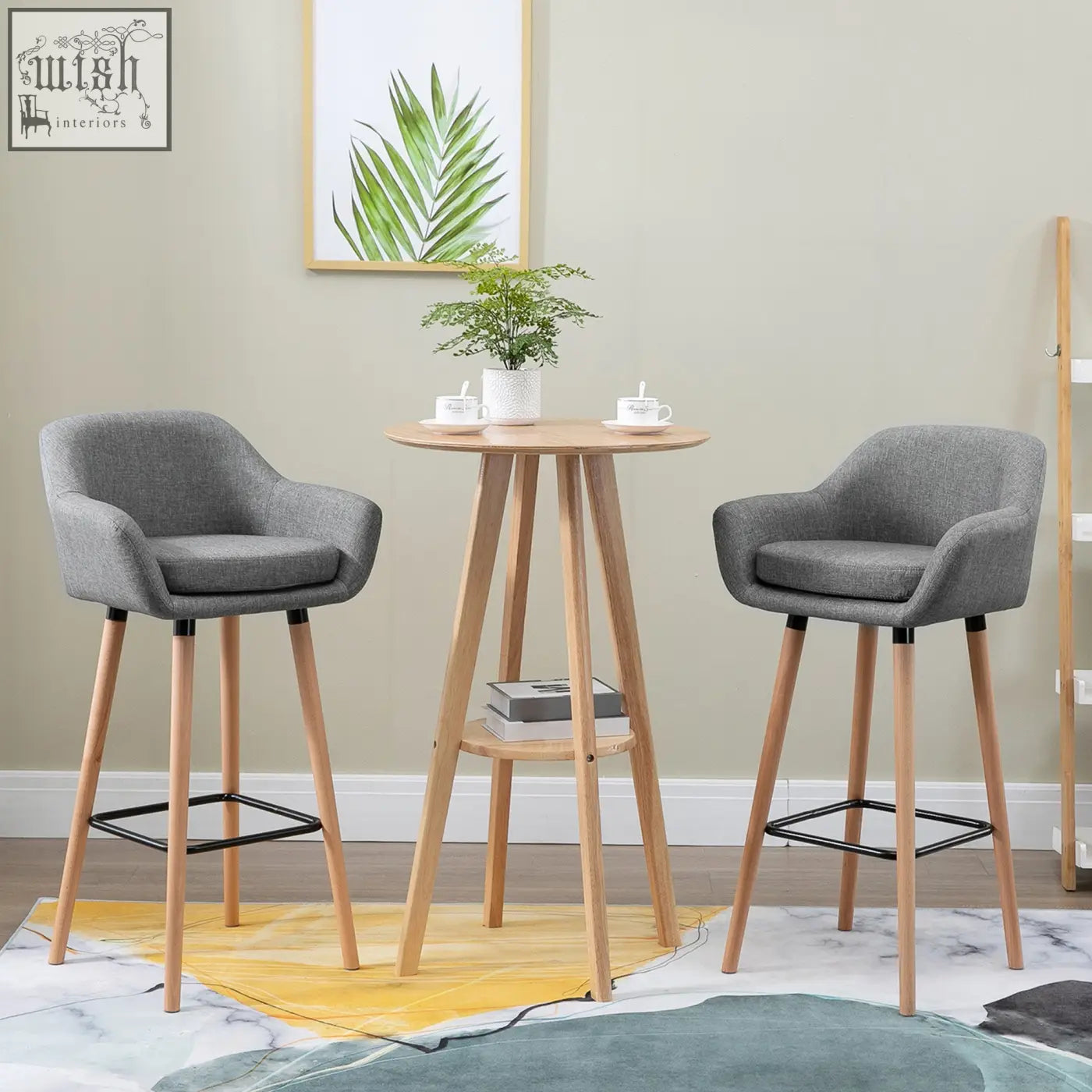 Gray bar stools with linen upholstery solid wood legs and black metal footrests for living room or dining room use