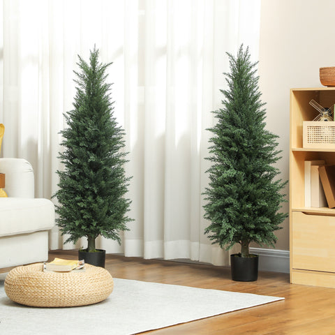 Two tall dark green artificial plants in black nursery pots perfect for green thumb indoor outdoor decor