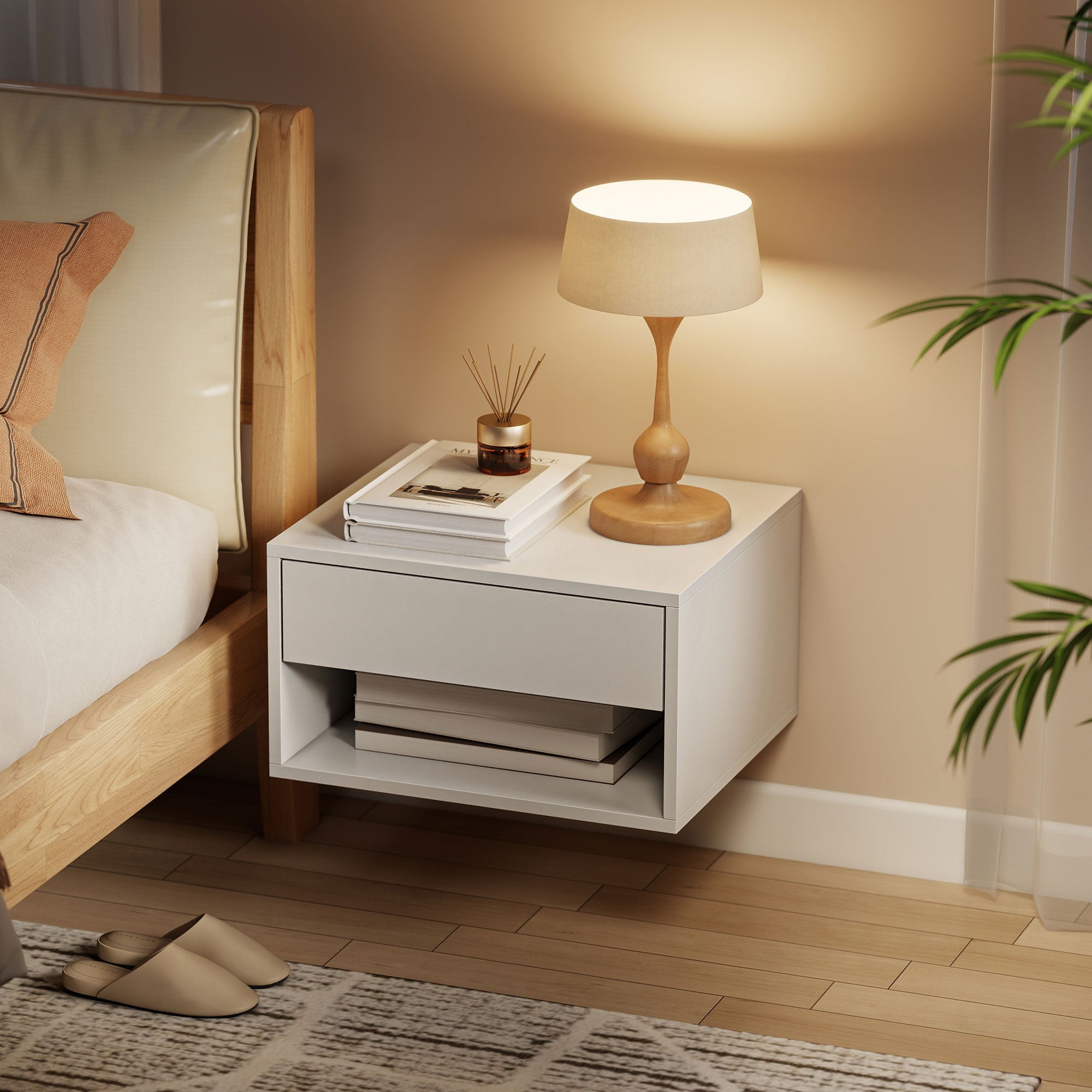 White minimalist bedside table with single drawer and open shelf made of particle board, modern floating design