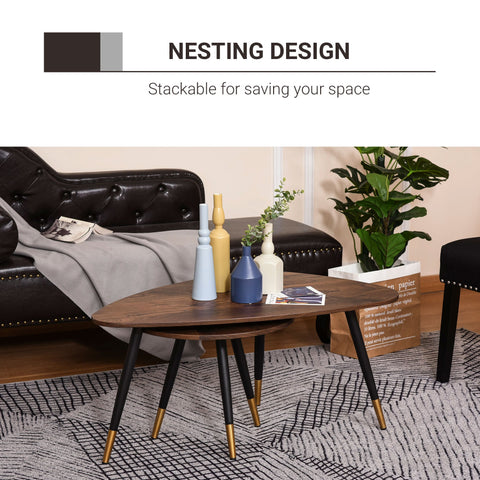 Modern nesting coffee tables set with dark walnut top and black legs with gold accents includes large and small table