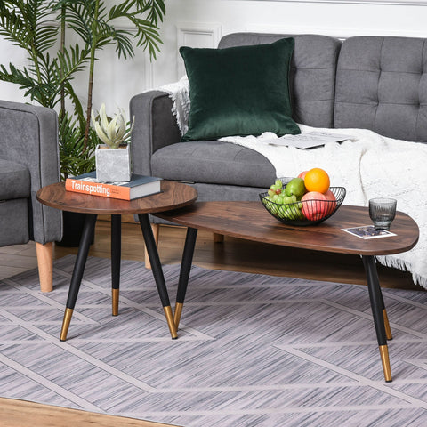 Scandinavian-style set of two coffee tables with dark wood walnut tops and black legs with gold caps for small or large table use