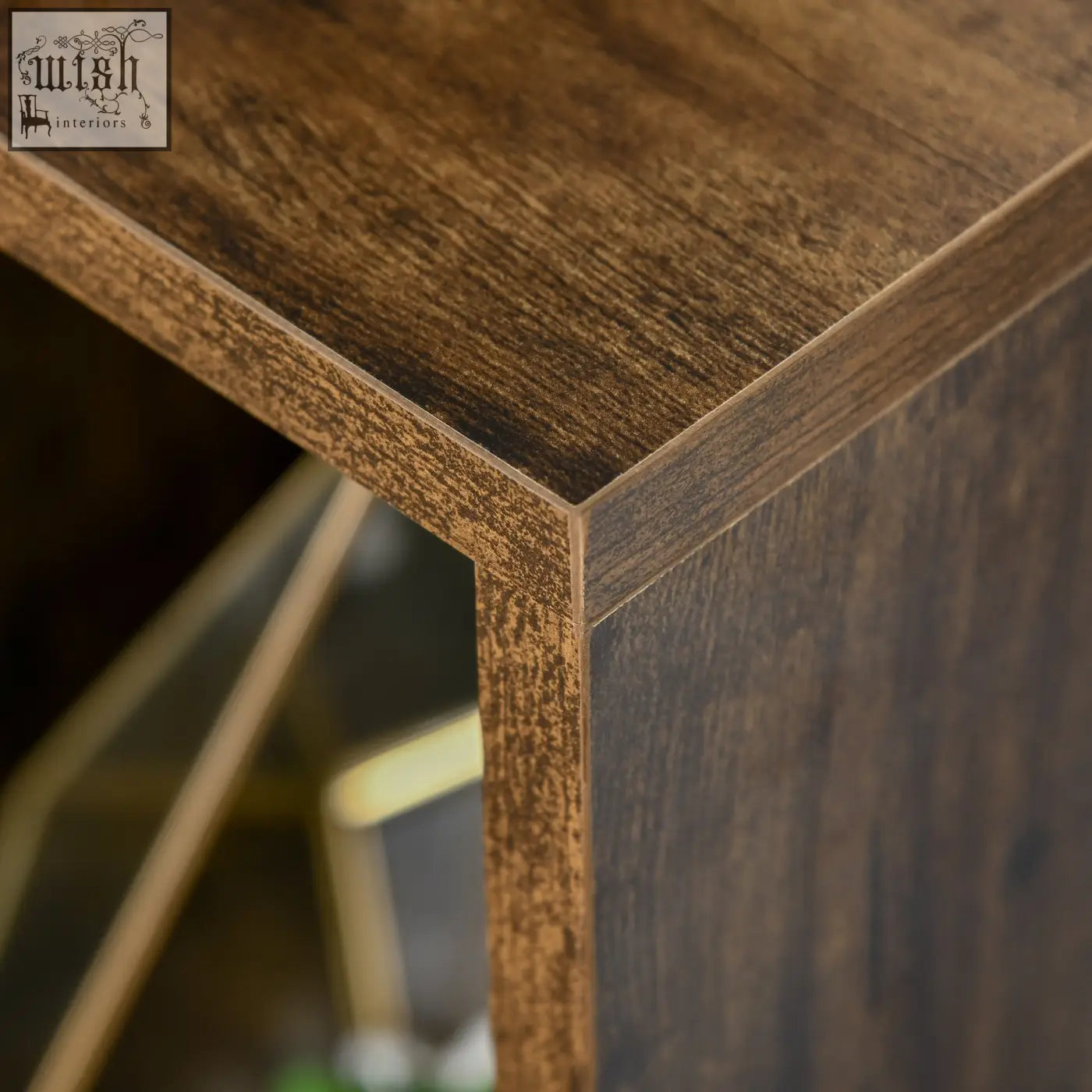 Corner of homcom seven-cube bookcase showing rustic brown particle board structure with visible wood grain pattern