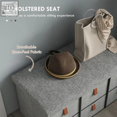 Gray upholstered homcom shoe bench with linen-feel fabric brown leather drawer pulls stores six shoe pairs comfortably
