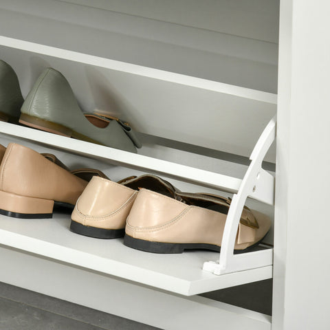 Beige leather loafers with black soles and gold-tone buckles displayed on a white homcom shoe cabinet with flip drawers and large storage