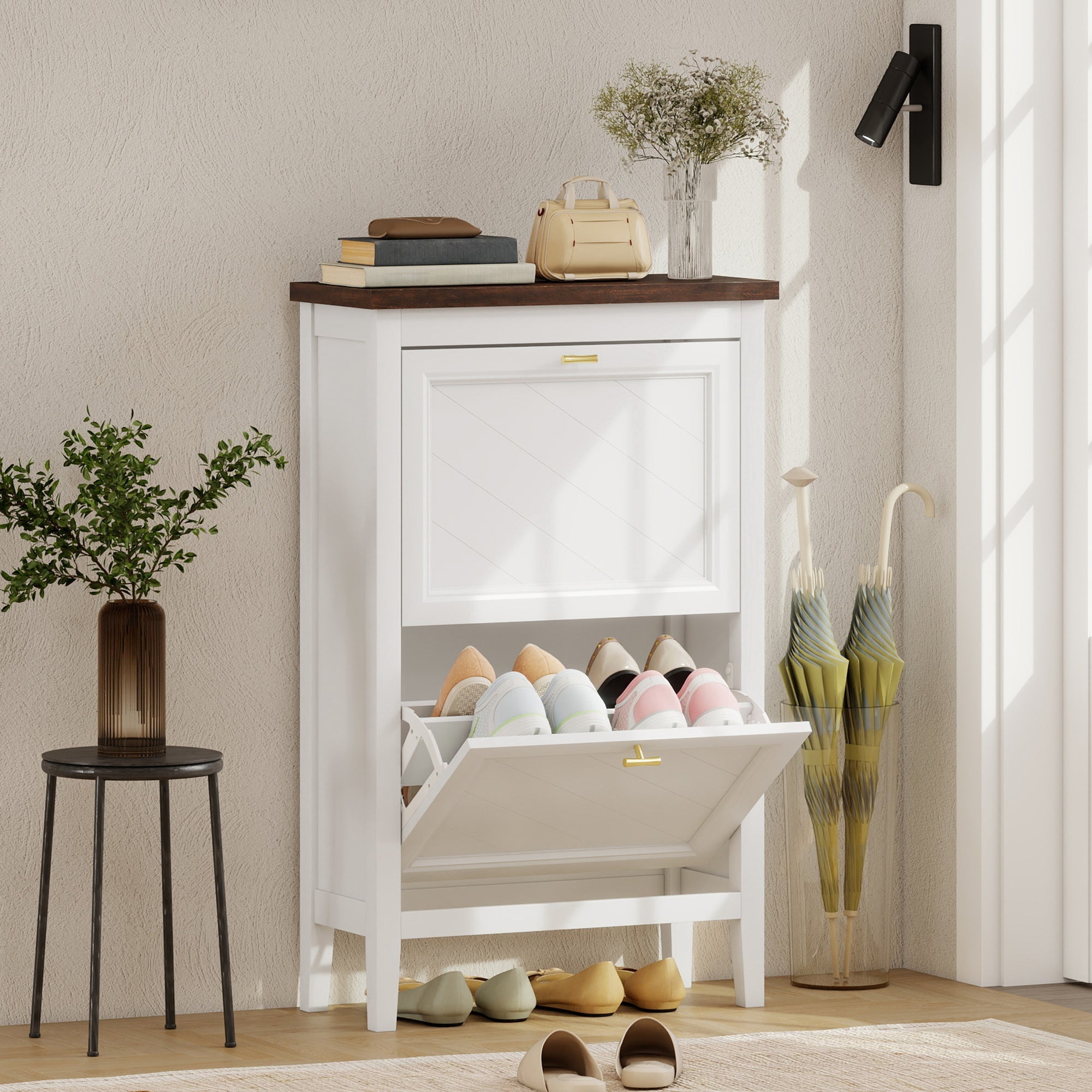 White wooden homcom shoe cabinet with dark brown top, gold hardware, flip drawers, and adjustable shelves for shoe storage