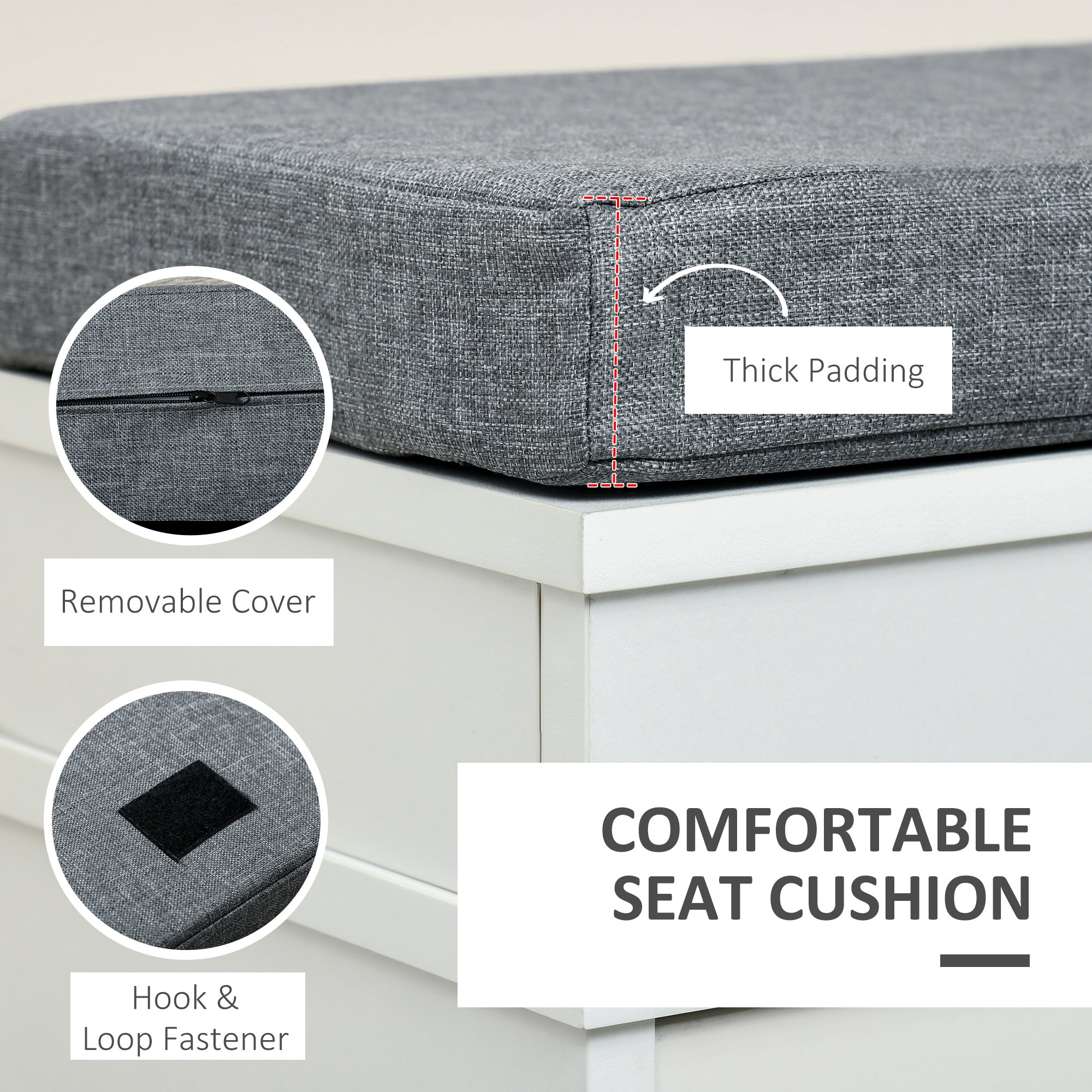 Gray textured fabric seat cushion with thick padding and removable cover on white particle board shoe storage bench