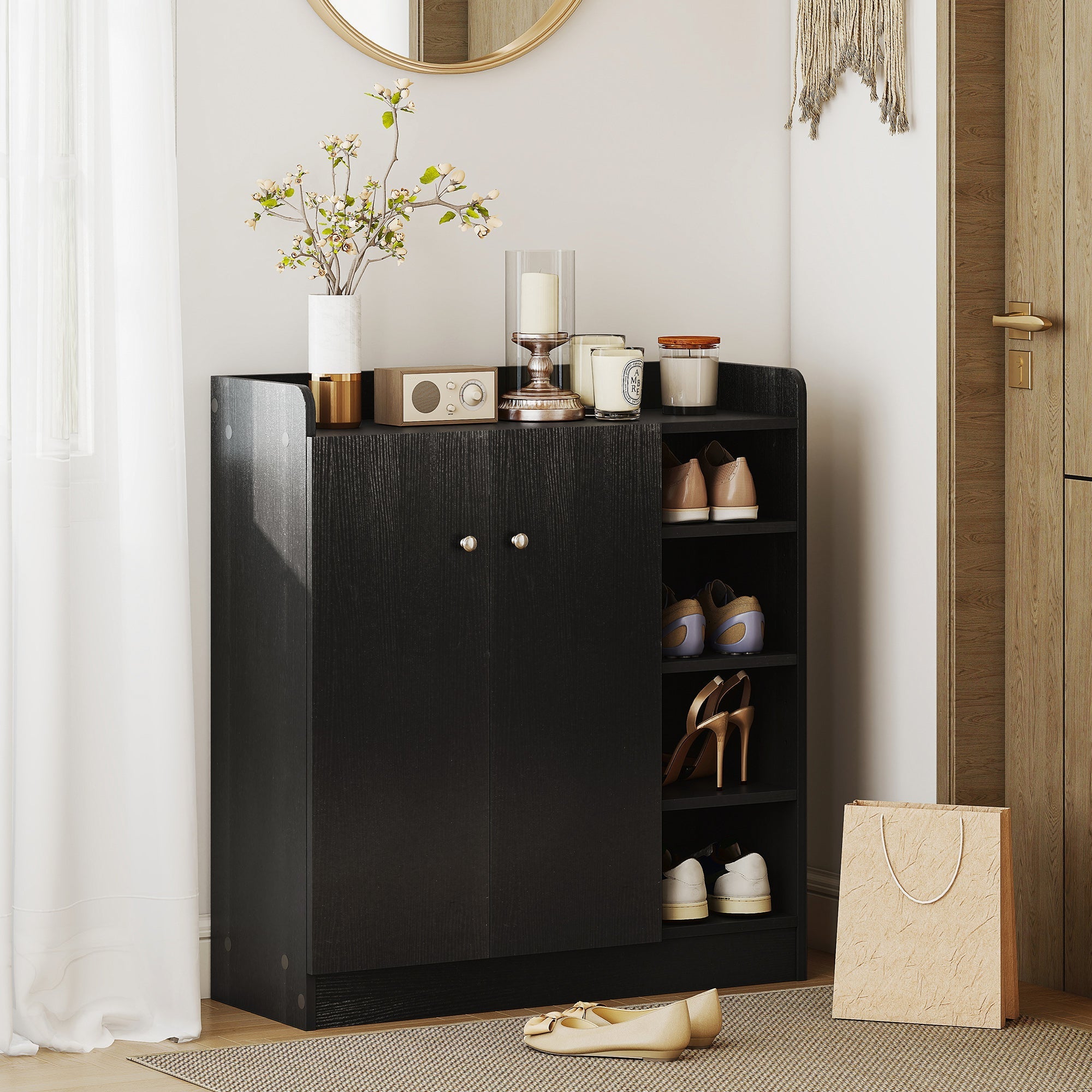 Black wooden shoe cabinet with two doors, adjustable shelves, and aluminium alloy handles for shoe storage by HOMCOM