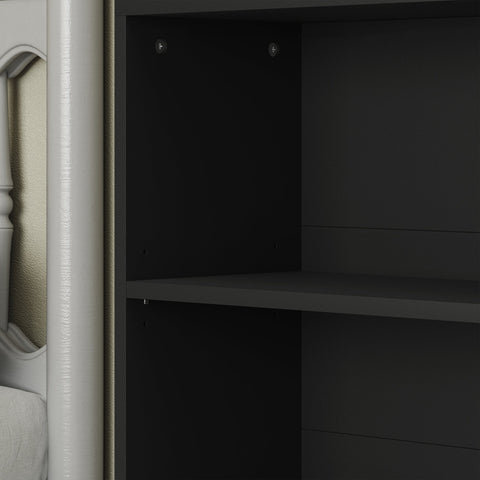White-painted wooden bookshelf with decorative frame and dark shelves featuring four adjustable particle board shelves