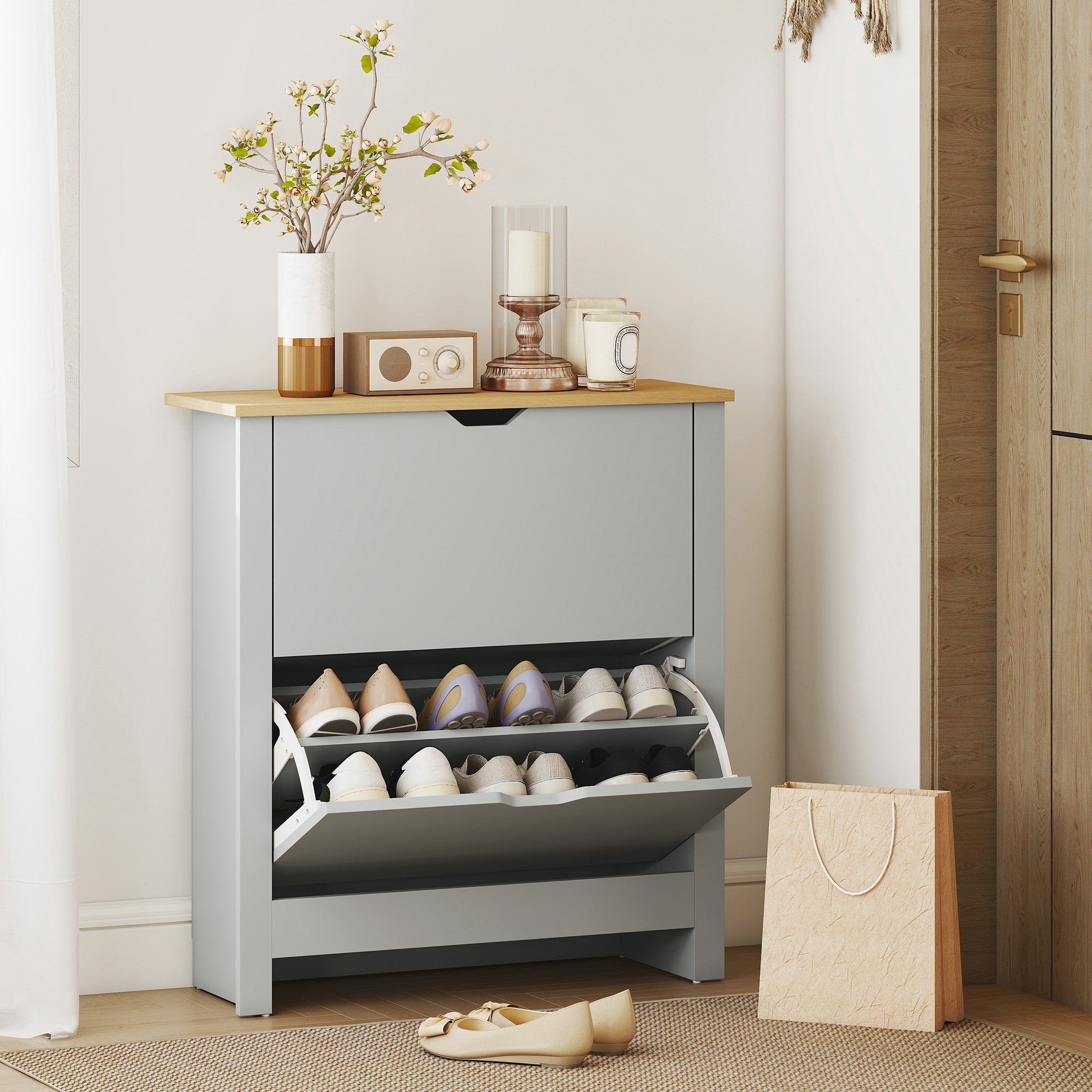 Gray minimalist shoe cabinet with wooden top and two pull-out shelves for shoes made of light grey particle board
