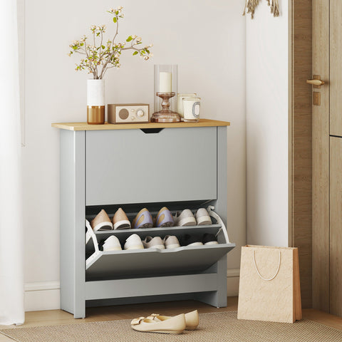 Gray minimalist shoe cabinet with wooden top and two pull-out shelves for shoes made of light grey particle board