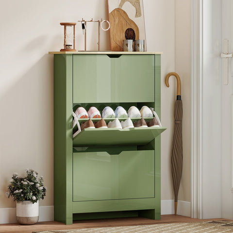 Modern matte high gloss green shoe cabinet made of particle board with pull-out shelf holding white and brown shoes