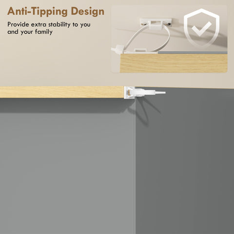 White plastic anti-tip bracket securing light grey particle board shoe cabinet to the wall for safety