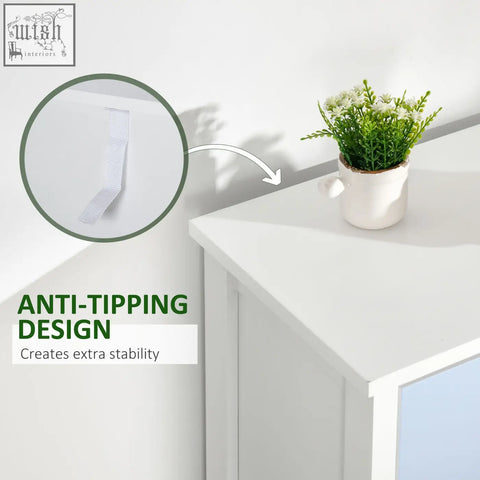 White ceramic mug with green foliage inside on homcom slim storage blue five drawers dresser with metal handles