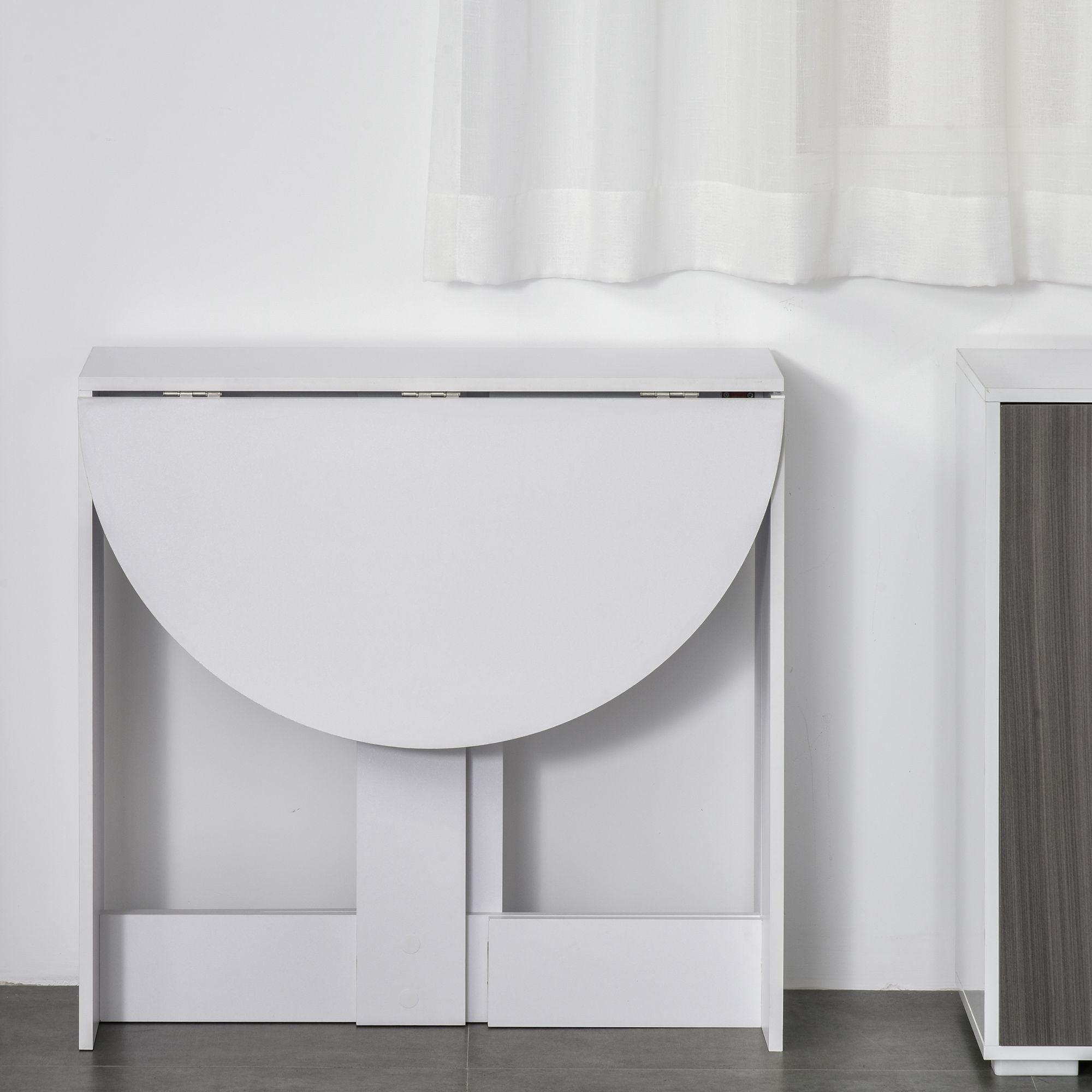 White homcom folding dining table with sleek minimalist design and rounded edges for small spaces