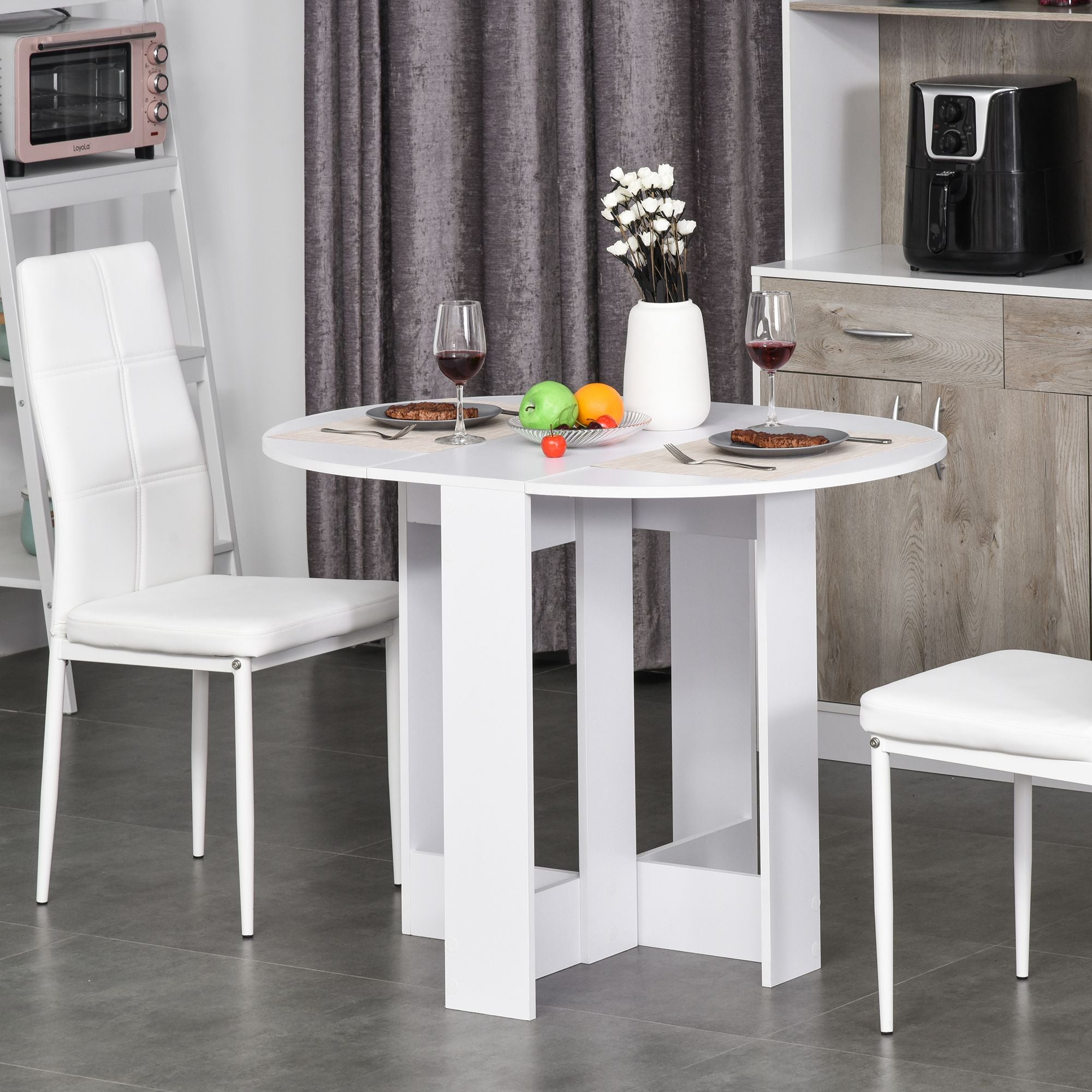 White round foldable dining table with minimalist legs perfect folding dining table for small kitchens and dining rooms