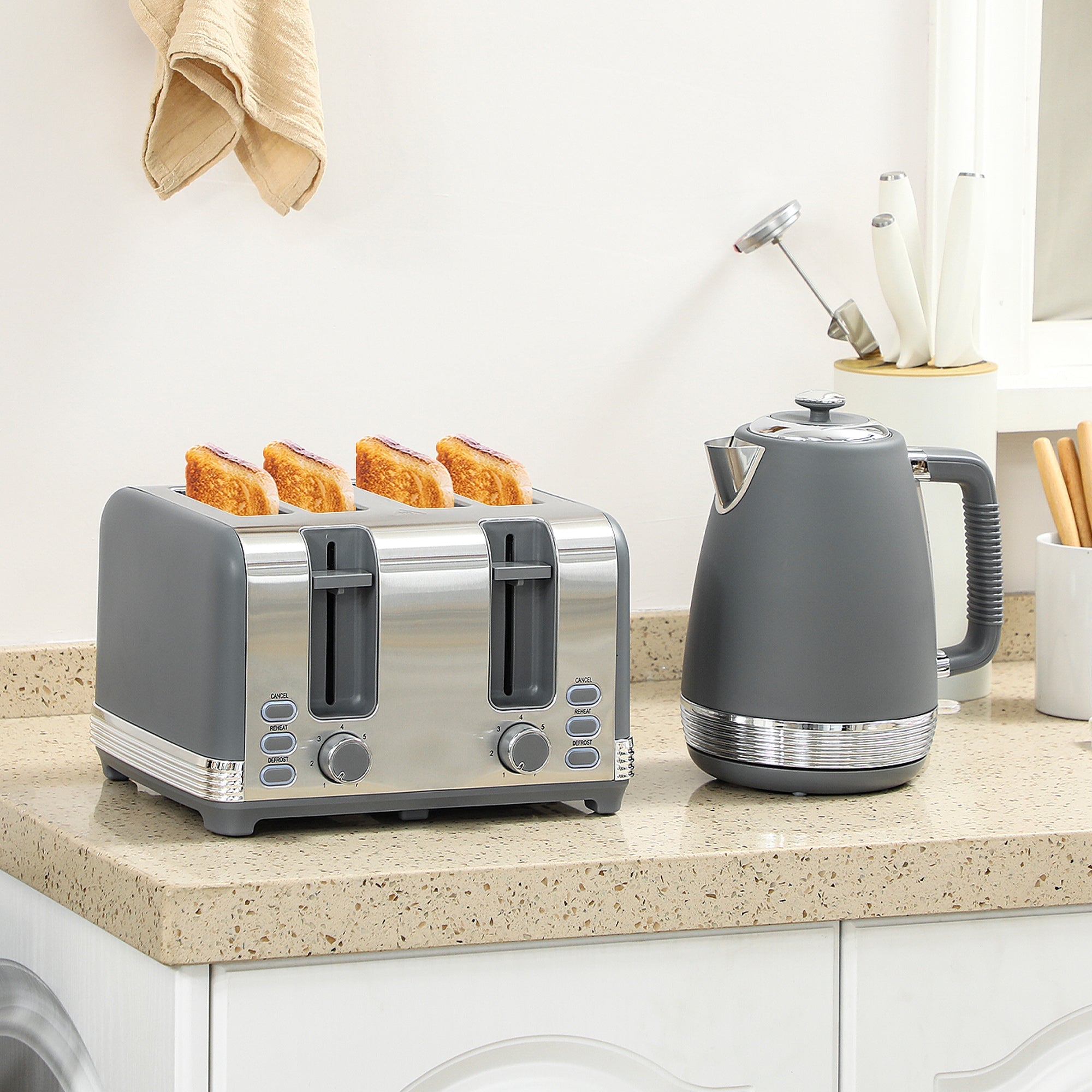 Gray and stainless steel four slice toaster with golden brown toast slots as part of homcom stainless steel toaster set with strix thermostat
