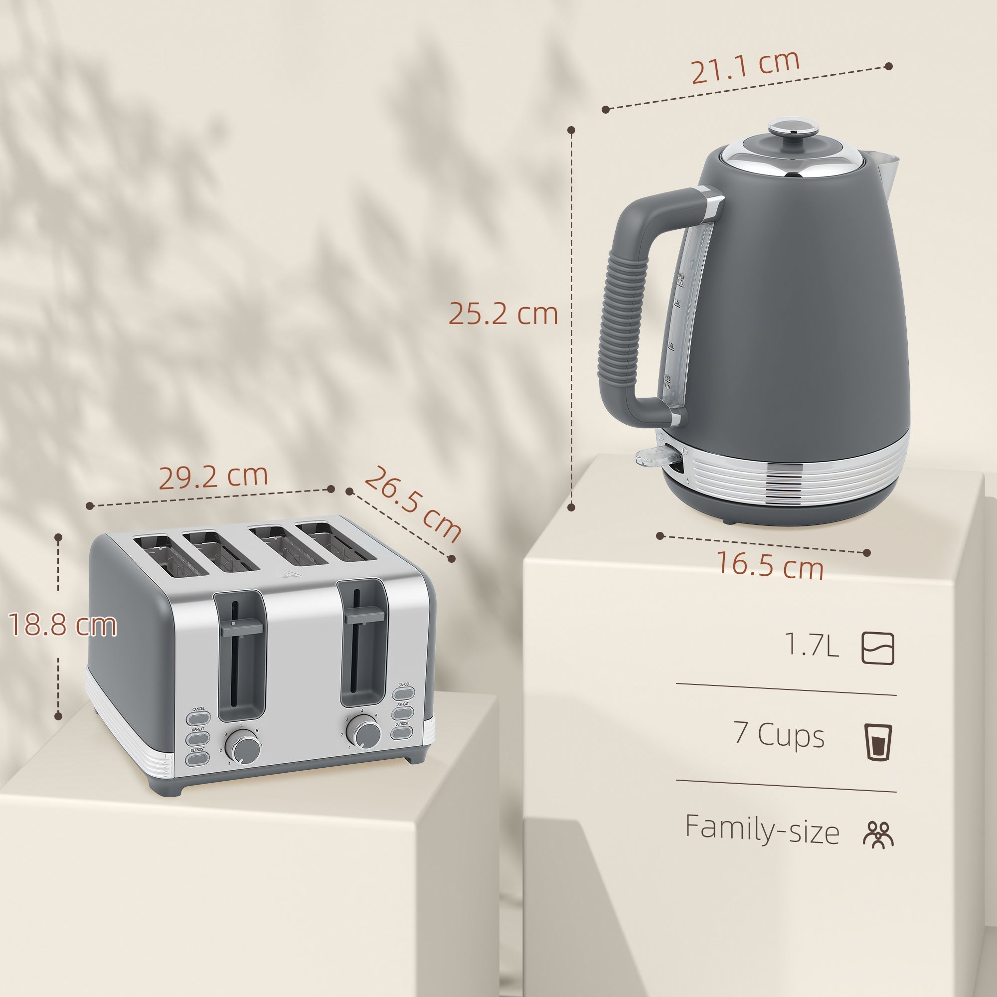 Gray and silver stainless steel kettle with textured handle and strix thermostat in homcom toaster set