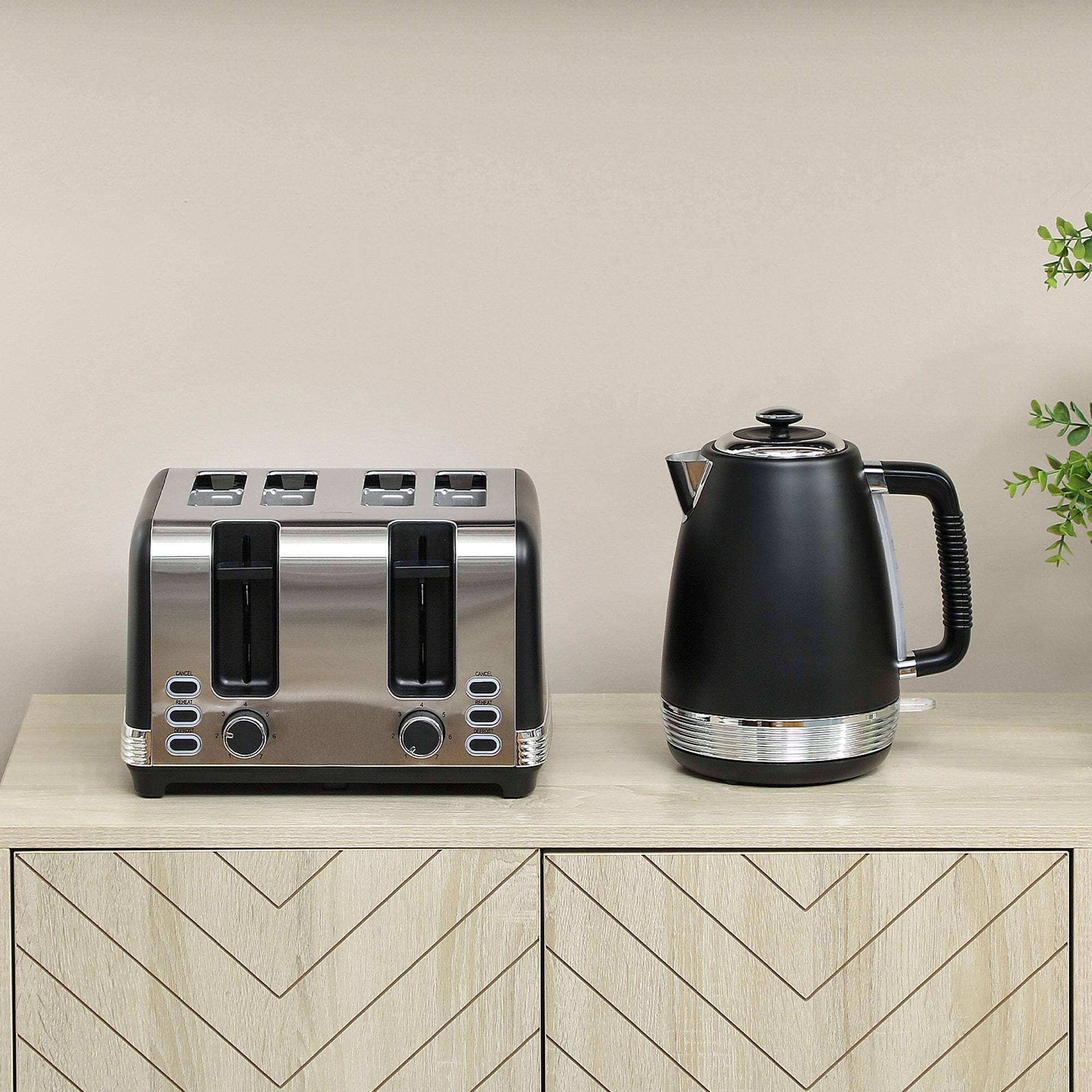 Stainless steel and black four-slice toaster with silver accents from homcom toaster set with strix thermostat control