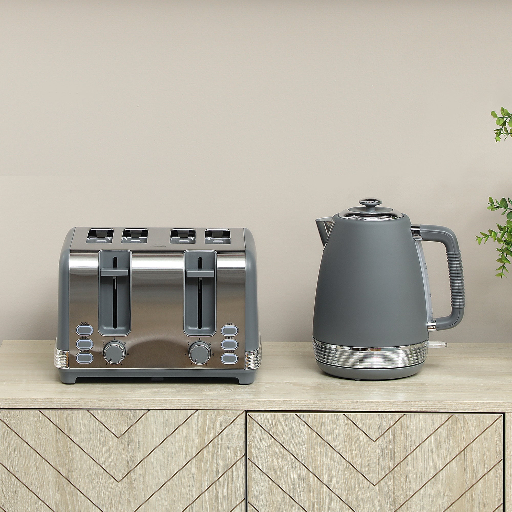 Gray and stainless steel four slice toaster with chrome accents featuring strix thermostat in homcom toaster set