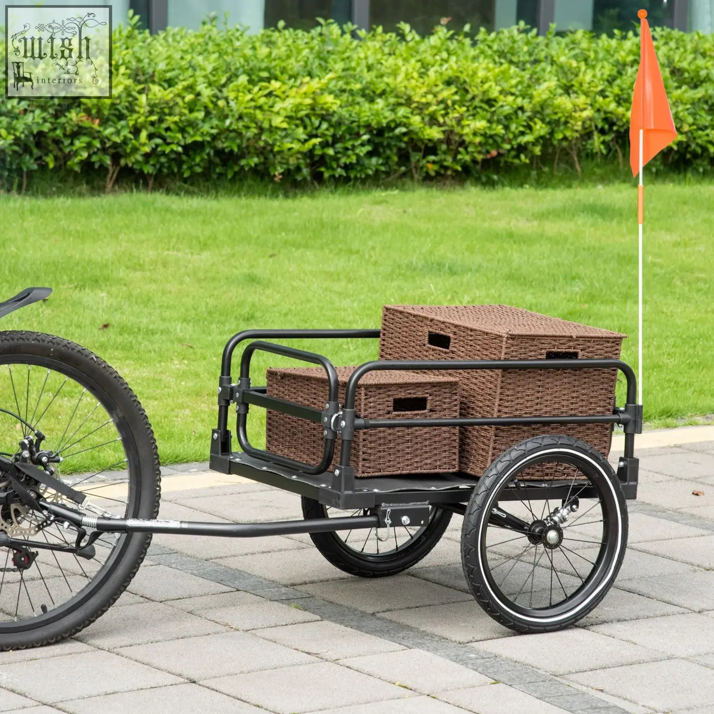 Back view of a black steel homcom bike trailer with three wheels, shock absorption, triple safety, and wicker storage boxes