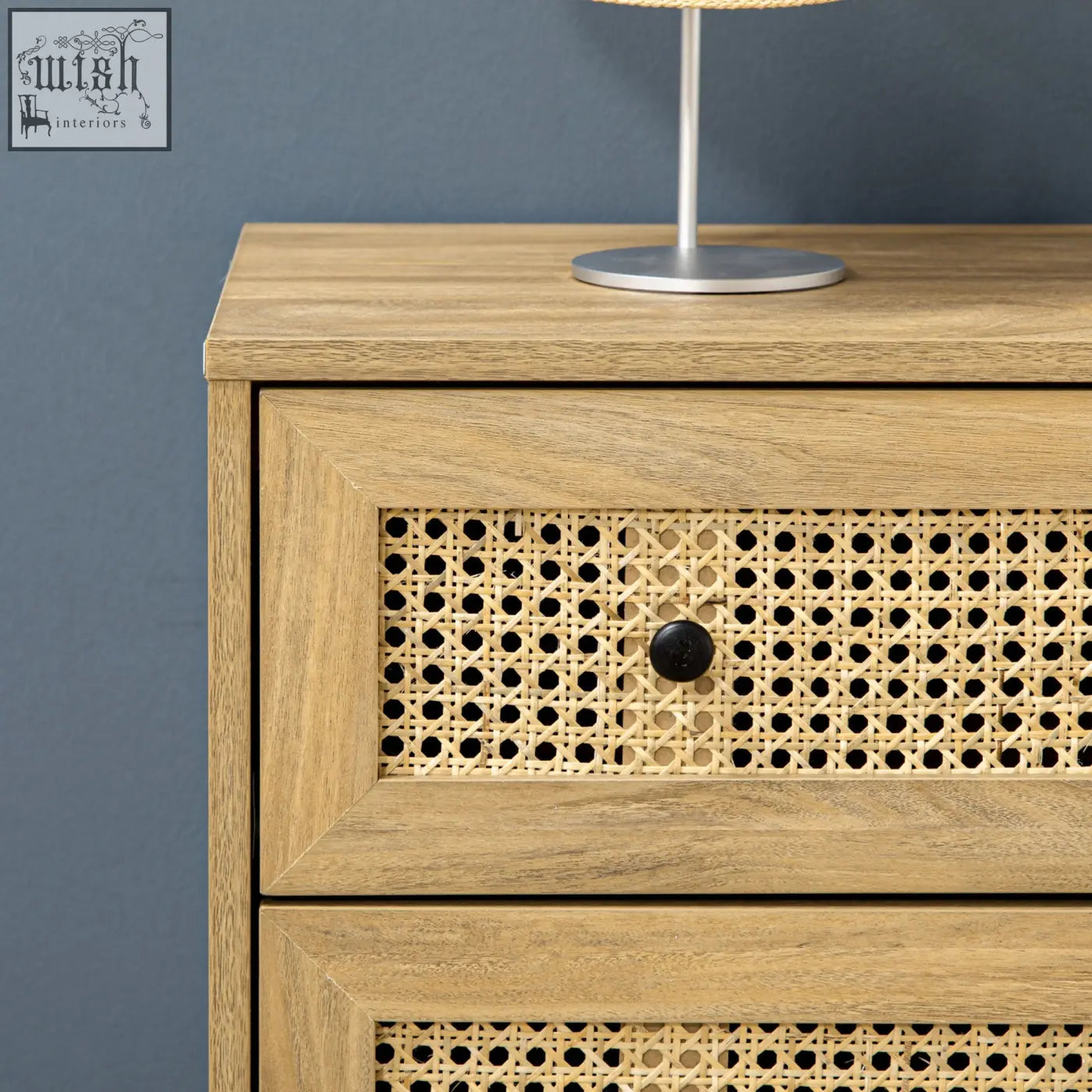 Light wood finish HOMCOM particle board nightstand with four cane weave drawers and black knobs with anti-tipping straps
