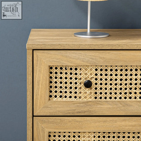 Light wood finish HOMCOM particle board nightstand with four cane weave drawers and black knobs with anti-tipping straps