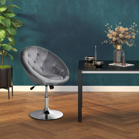 Gray velvet-feel upholstered swivel dressing stool with button tufting and chrome base for vanity or dining use