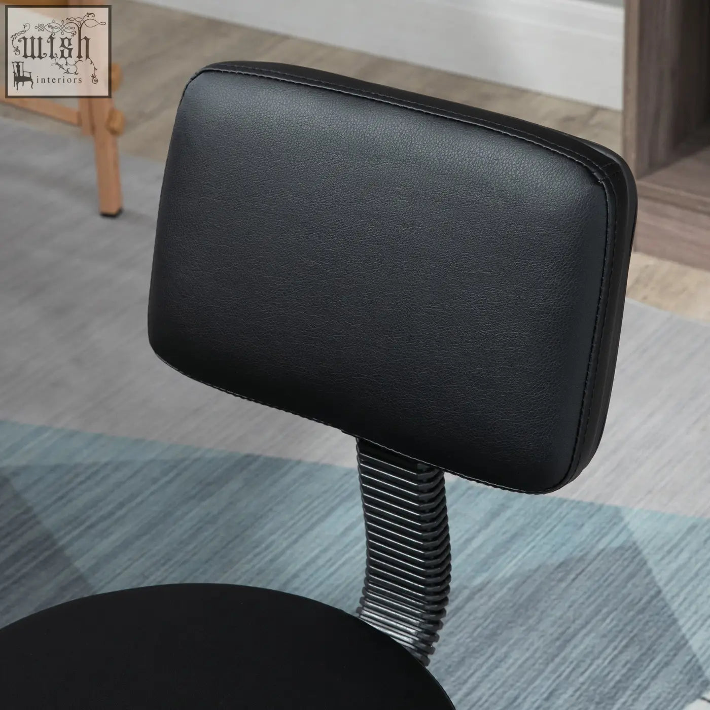 Back view of homcom swivel salon chair with black padded seat, height adjustable five wheels, and faux leather headrest