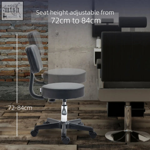 Adjustable black leatherette salon chair with padded seat back five wheels chrome base height adjustable for salon use