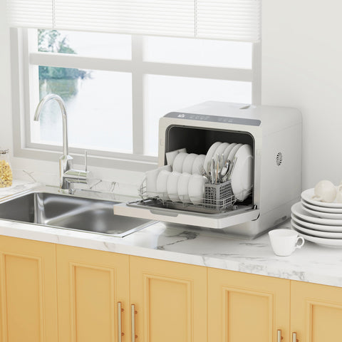 White homcom tabletop dishwasher with sleek design open door showing bowl rack and drain hose clamp inside